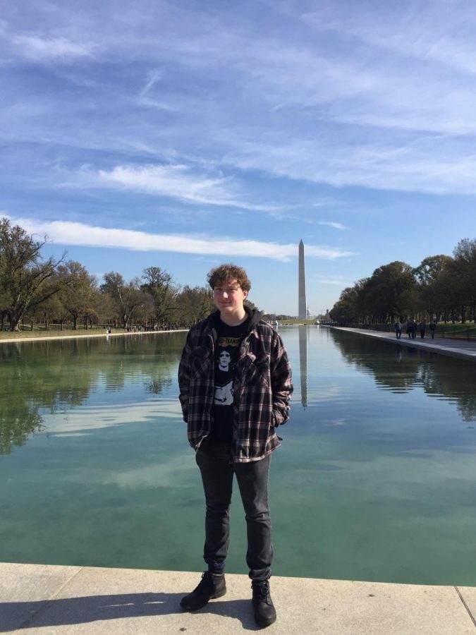 Editor-in-Chief and senior Joseph Beeson poses at the Washington Monument last fall during the national journalism convention in D.C.