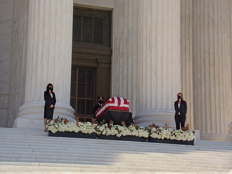 Supreme Court Justice Ruth Bader Ginsberg lies in state at the nations capitol at the top of the Supreme Court steps.