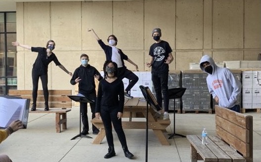 Easts theater ensemble created radio shows to fill the gaps left by live show shutdown. Radio show cast poses for a photo during rehearsal: Elizabeth Novak, Andrew Biallas, Ava Johnson, Parker Moran, Ryan Forde, Caven Menezese.