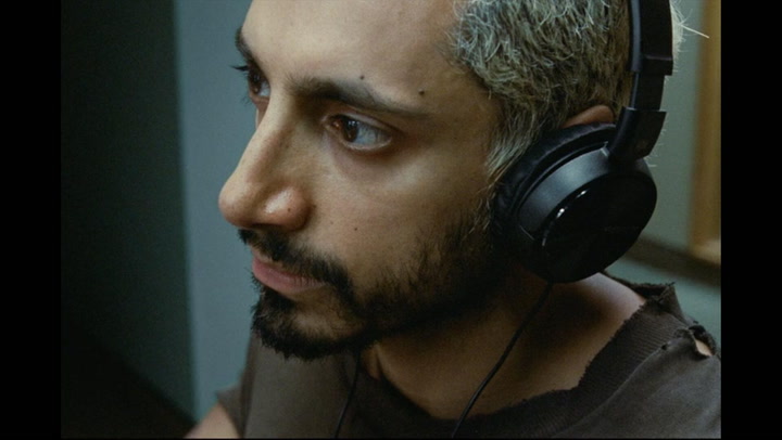 Ruben (Riz Amhed) struggles to come to terms with his audiologists ultimatum to stop playing music. He hears his words through a pair of headphones that amplify sound. 