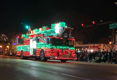 The St. Charles Fire department lights up the streets with their decked-out fire trucks. Photo by Ava Brucal