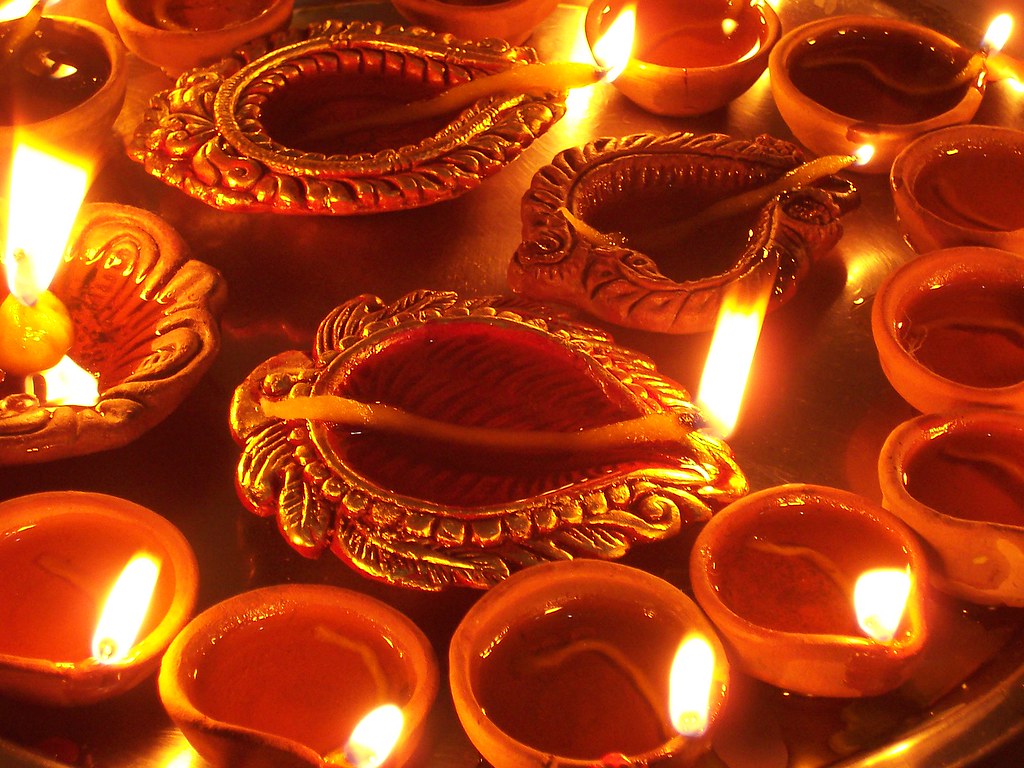 Painted clay lamps shine bright during Diwali. Photo courtesy of
Flickr.