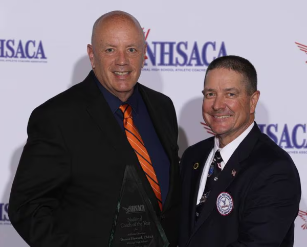 Athletic Director Darren Howard (left) with President of the National High School Athletic Coaches Association Rocky Ruhl (right). Photo by Matthew Putney.