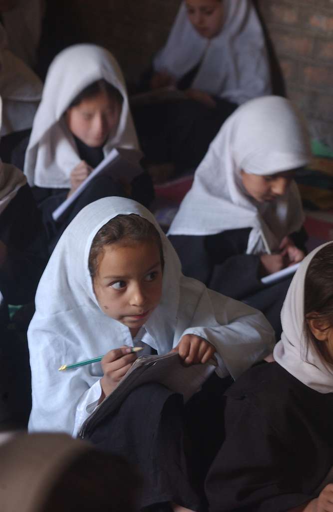 Afghan girls sit in a classroom in 2002 as part of an educational program seeking to improve girl's education. Photo courtesy of PICRYL. 