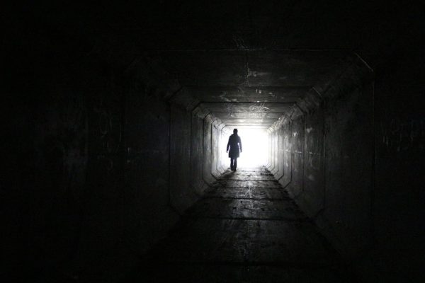 Light shining at the end of a dark tunnel. Photo courtesy of PICRYL.