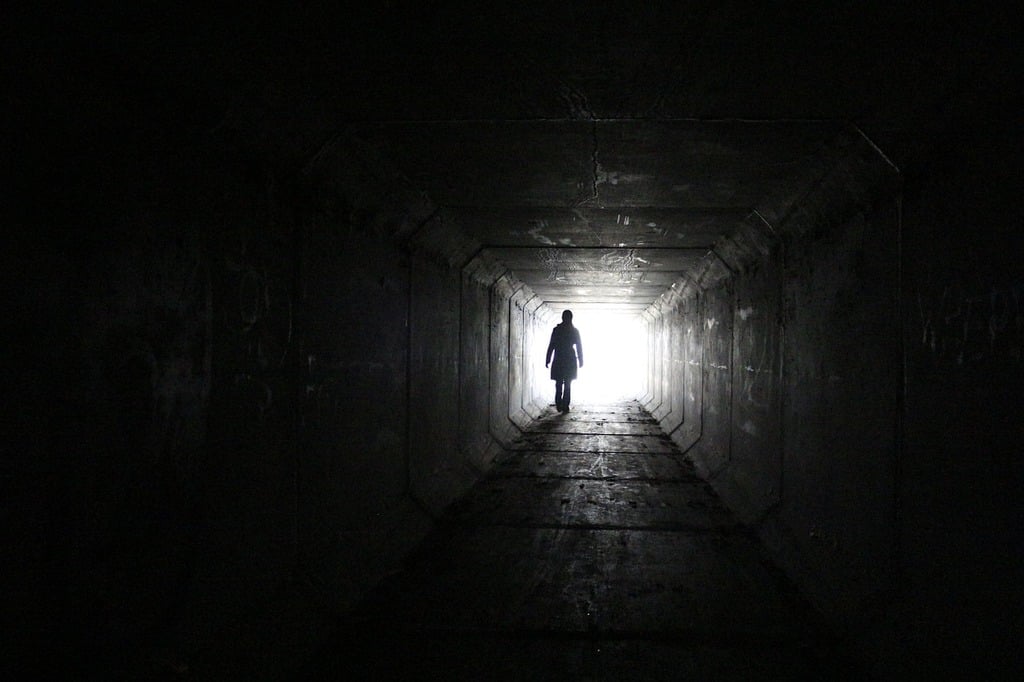Light shining at the end of a dark tunnel. Photo courtesy of PICRYL.