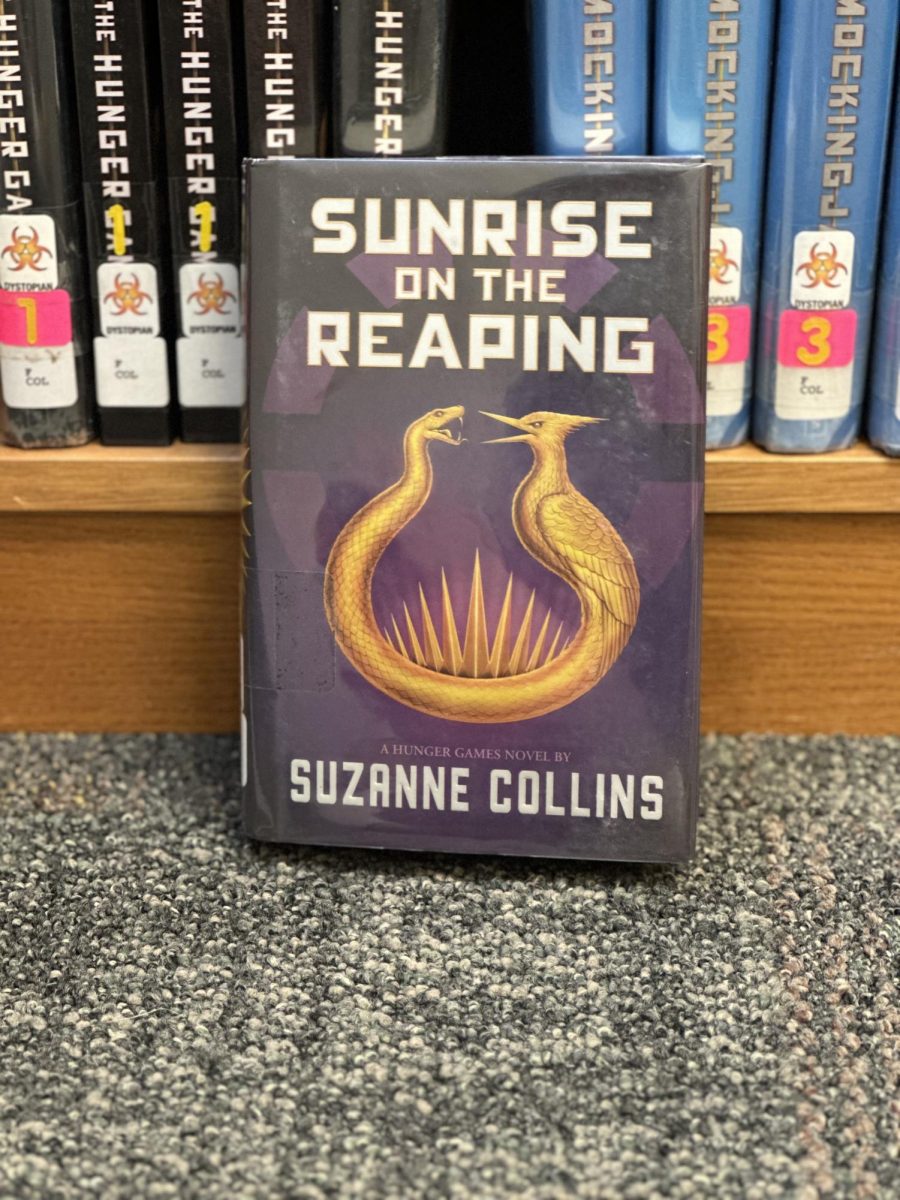 Sunrise on the Reaping book cover. Photo by Hayden Kropp.