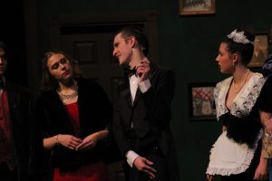 Left to right: Giana Borri as Miss Scarlet, Brody Tyner as Wadsworth and Chloe Mallon as Yvette. Photo by Lauren Voigt.